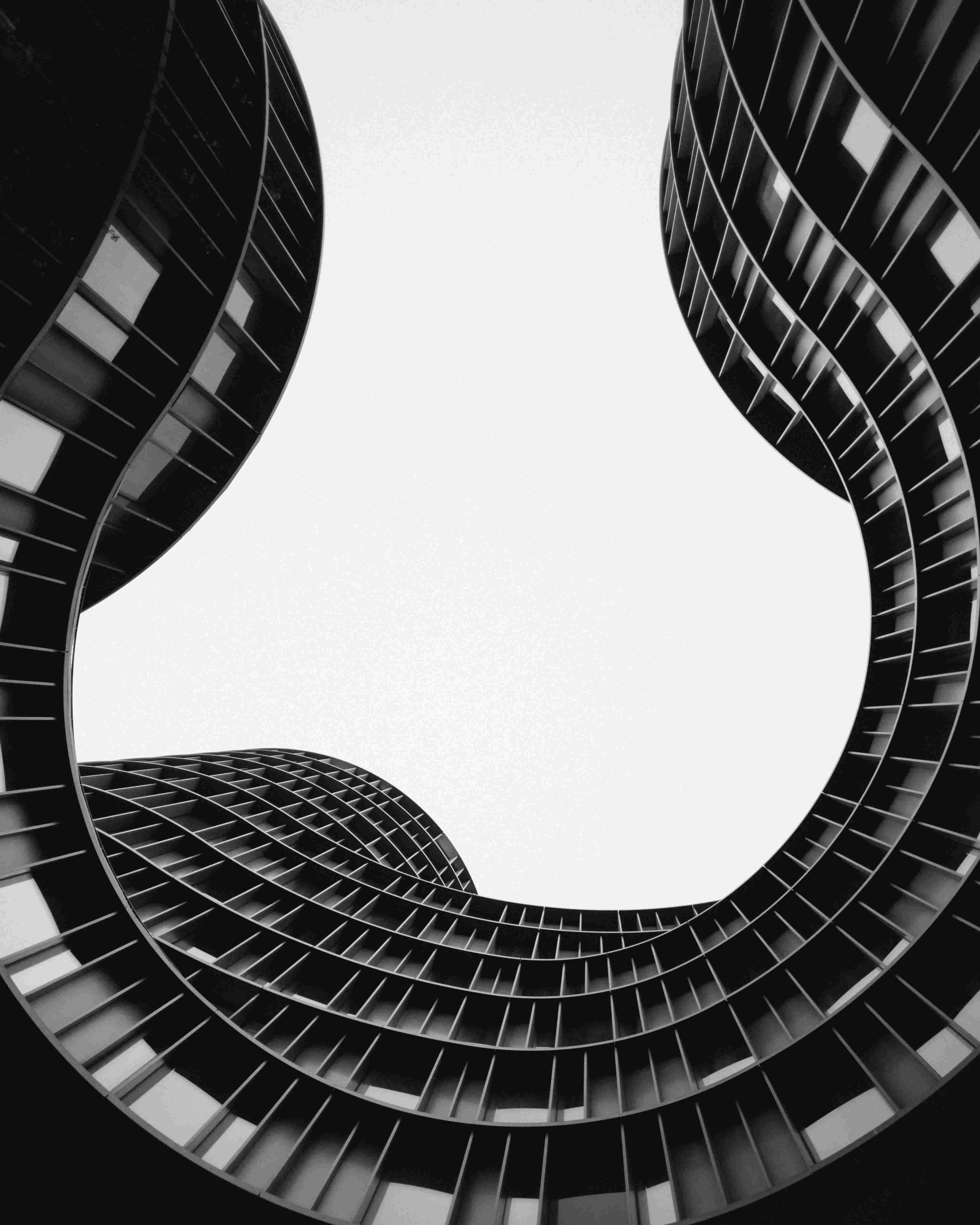 picture, low-angle shot of a horseshoe-shaped building