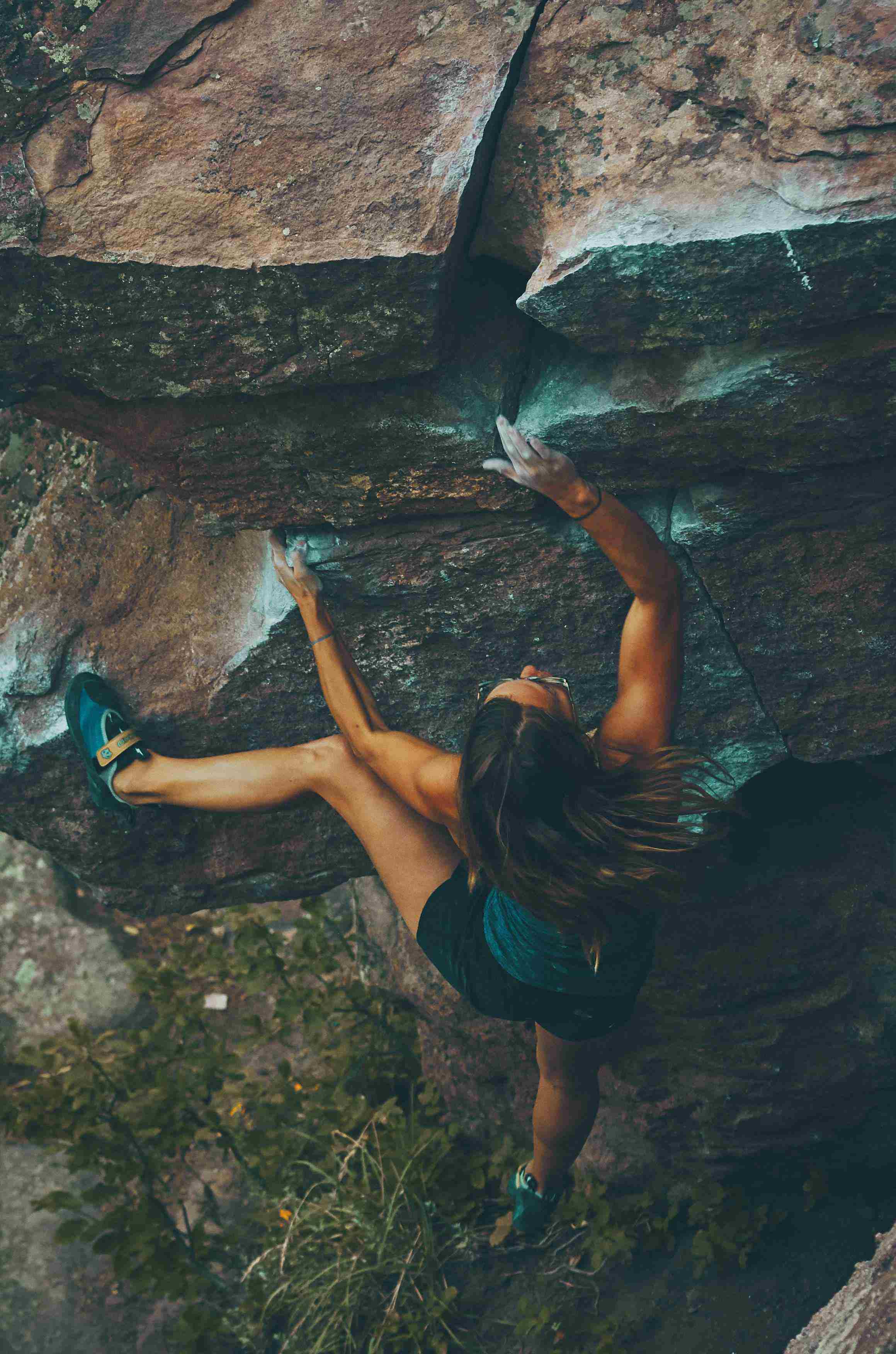 picture, woman rock climbing shot from behind