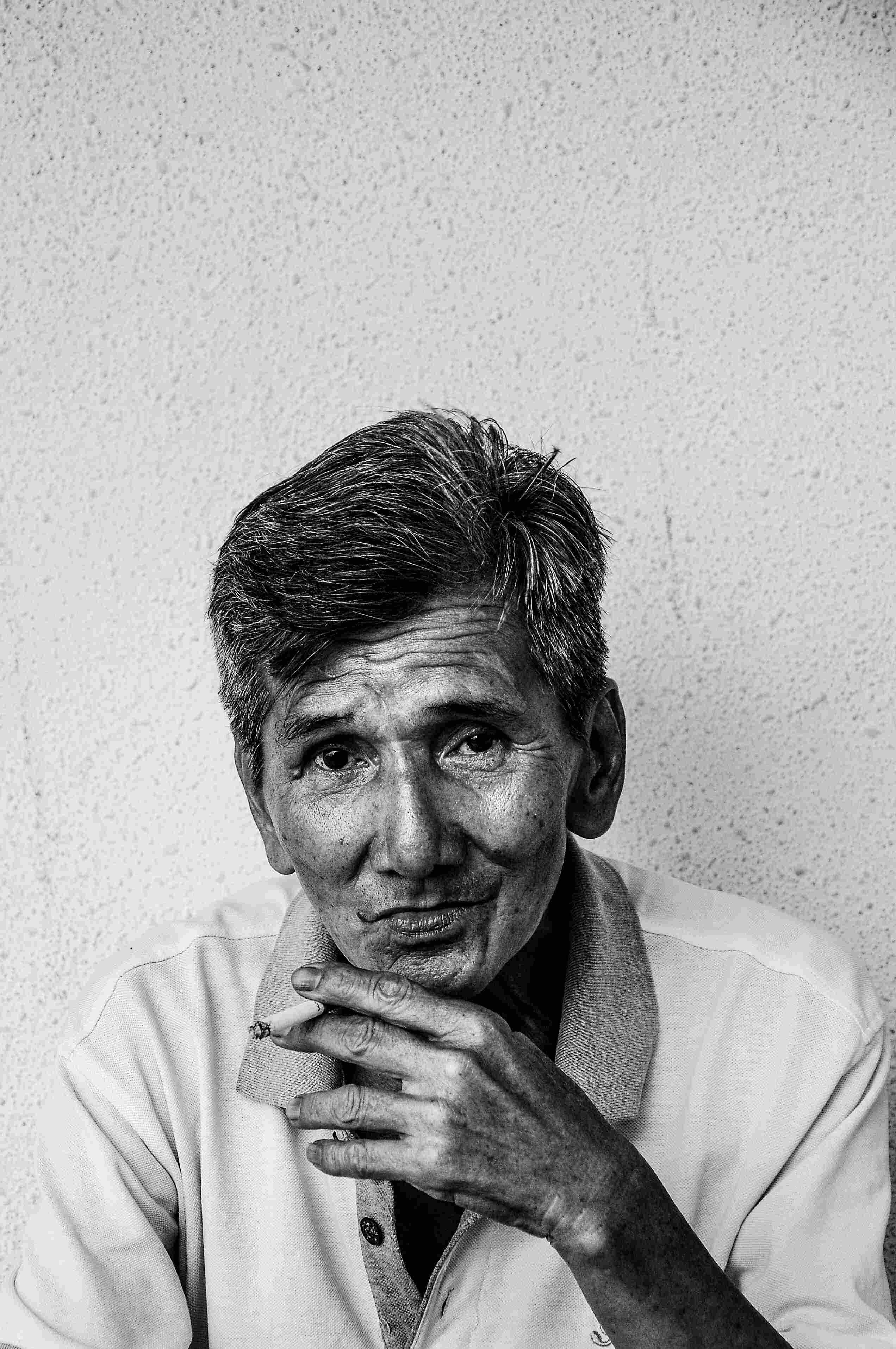 picture, portrait of an old man smoking
