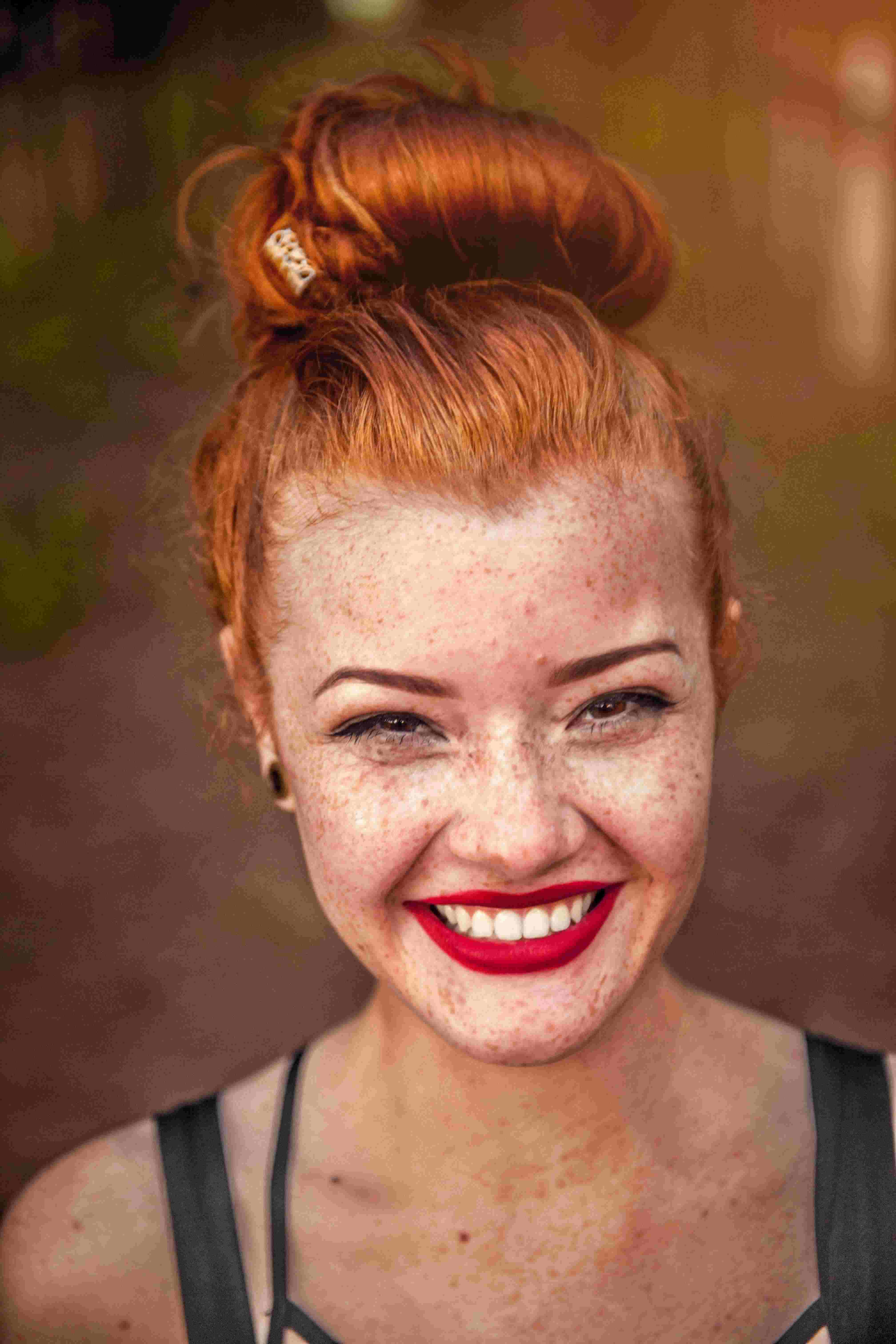 picture, close-up shot of a smiling, red-haired girl