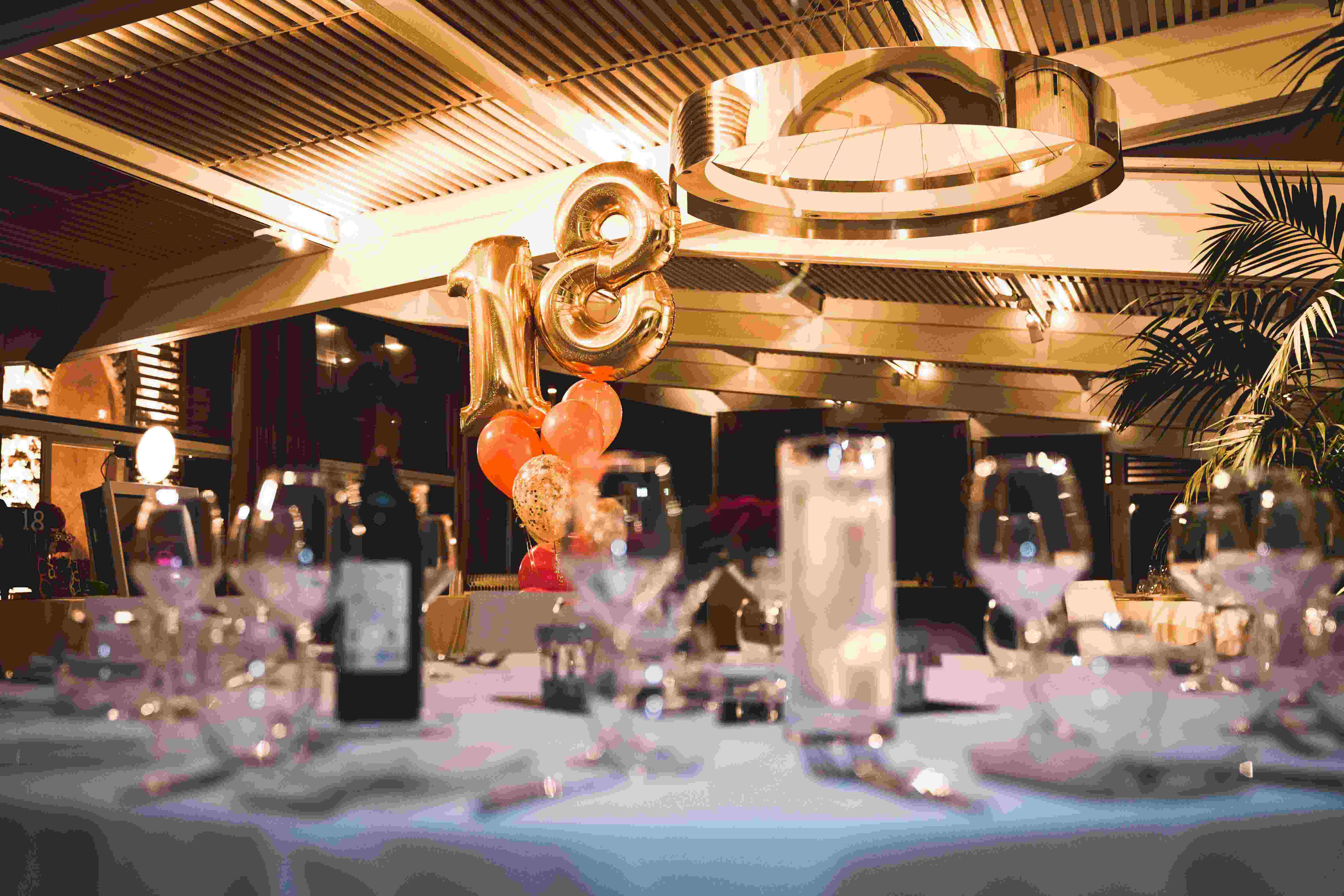 picture, party venue with a set table and balloons